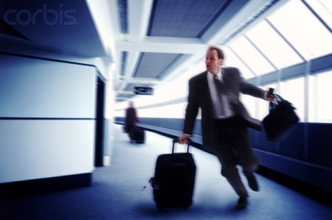 Businessman Running to Catch a Flight